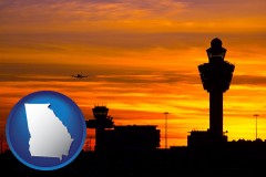 georgia map icon and an airport terminal and control tower at sunset