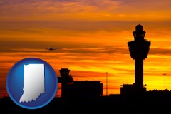 indiana map icon and an airport terminal and control tower at sunset