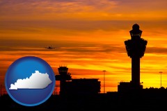 kentucky map icon and an airport terminal and control tower at sunset