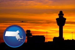 massachusetts map icon and an airport terminal and control tower at sunset