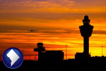 an airport terminal and control tower at sunset - with Washington, DC icon